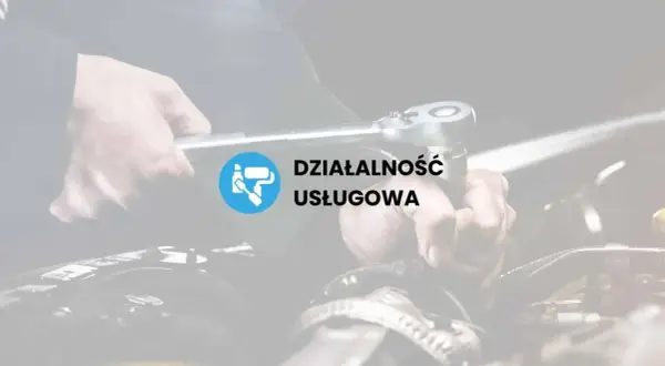 Ręce mechanika przy pracy z kluczem. Dowiedz się, ile zarabia mechanik w ramach działalności usługowej.